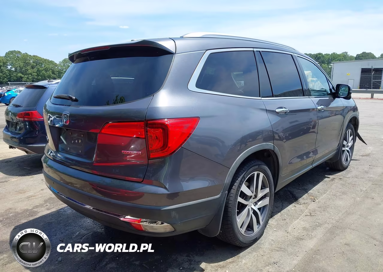 2016 Honda Pilot Touring VIN:5FNYF5H9XGB031138 - 4
