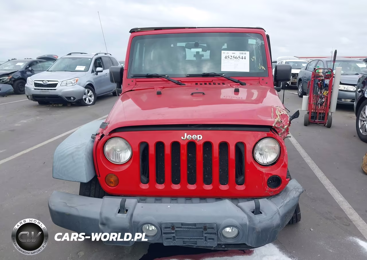 2011 Jeep Wrangler Sport VIN:1J4AA2D19BL636413 - 12