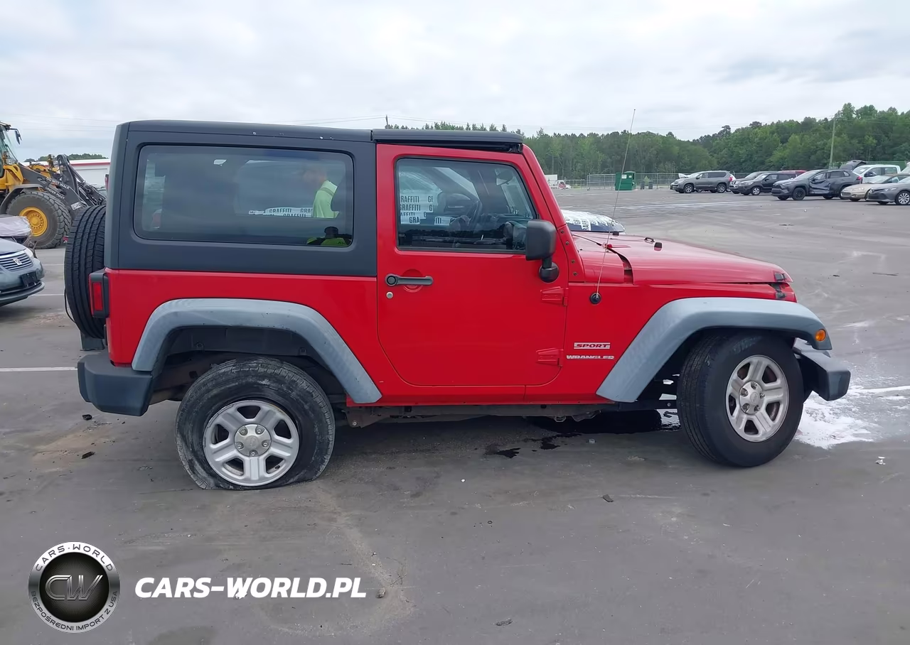 2011 Jeep Wrangler Sport VIN:1J4AA2D19BL636413 - 13