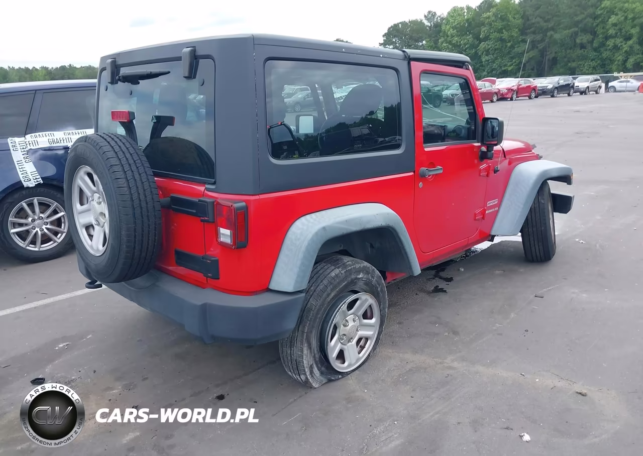 2011 Jeep Wrangler Sport VIN:1J4AA2D19BL636413 - 4