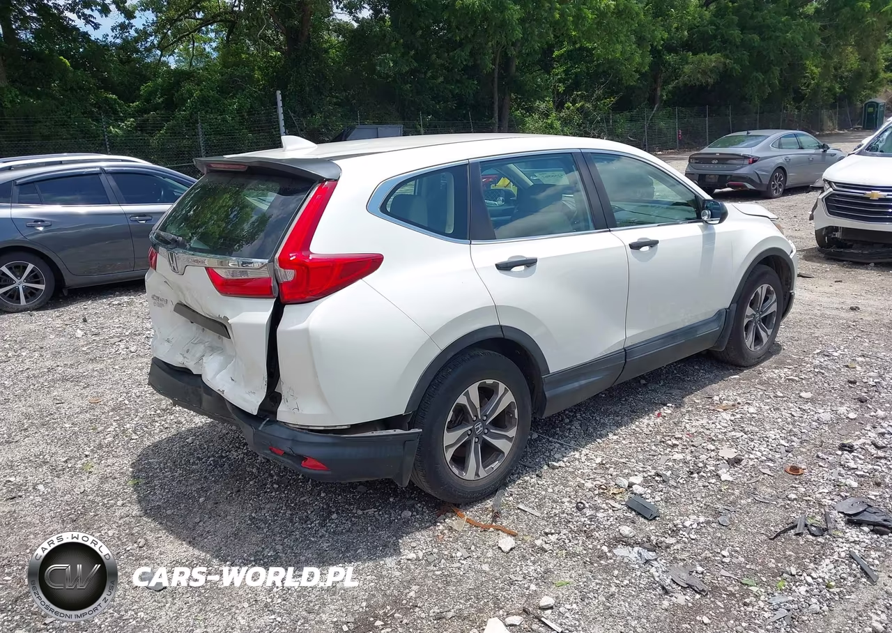 2018 Honda Cr-V Lx VIN:2HKRW5H35JH404711 - 4