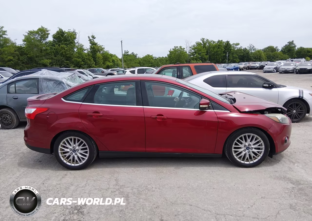 2014 Ford Focus Titanium VIN:1FADP3J26EL105412 - 13