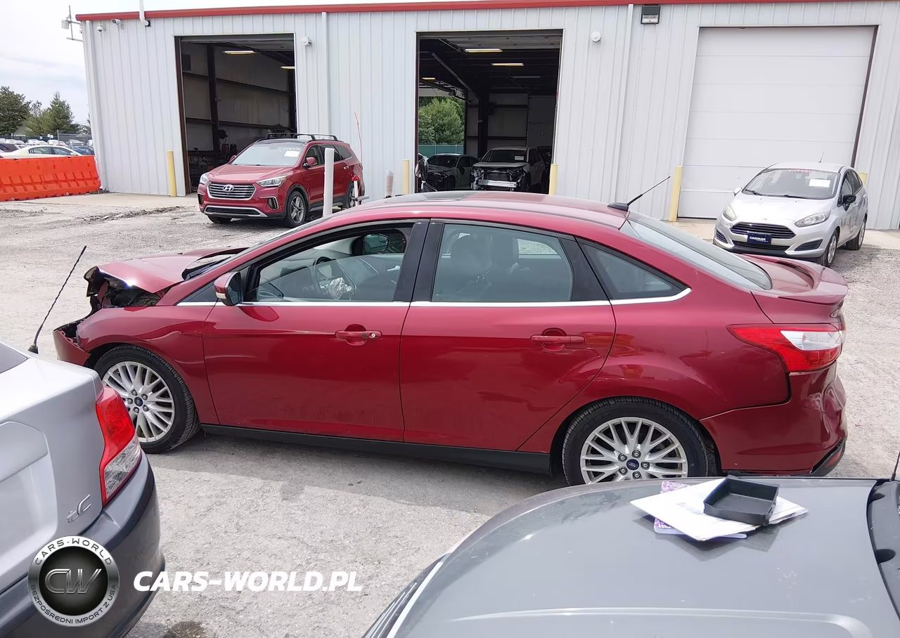 2014 Ford Focus Titanium VIN:1FADP3J26EL105412 - 14