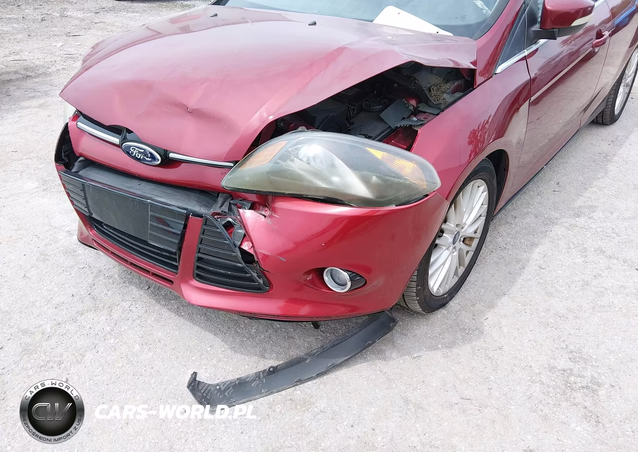 2014 Ford Focus Titanium VIN:1FADP3J26EL105412 - 6
