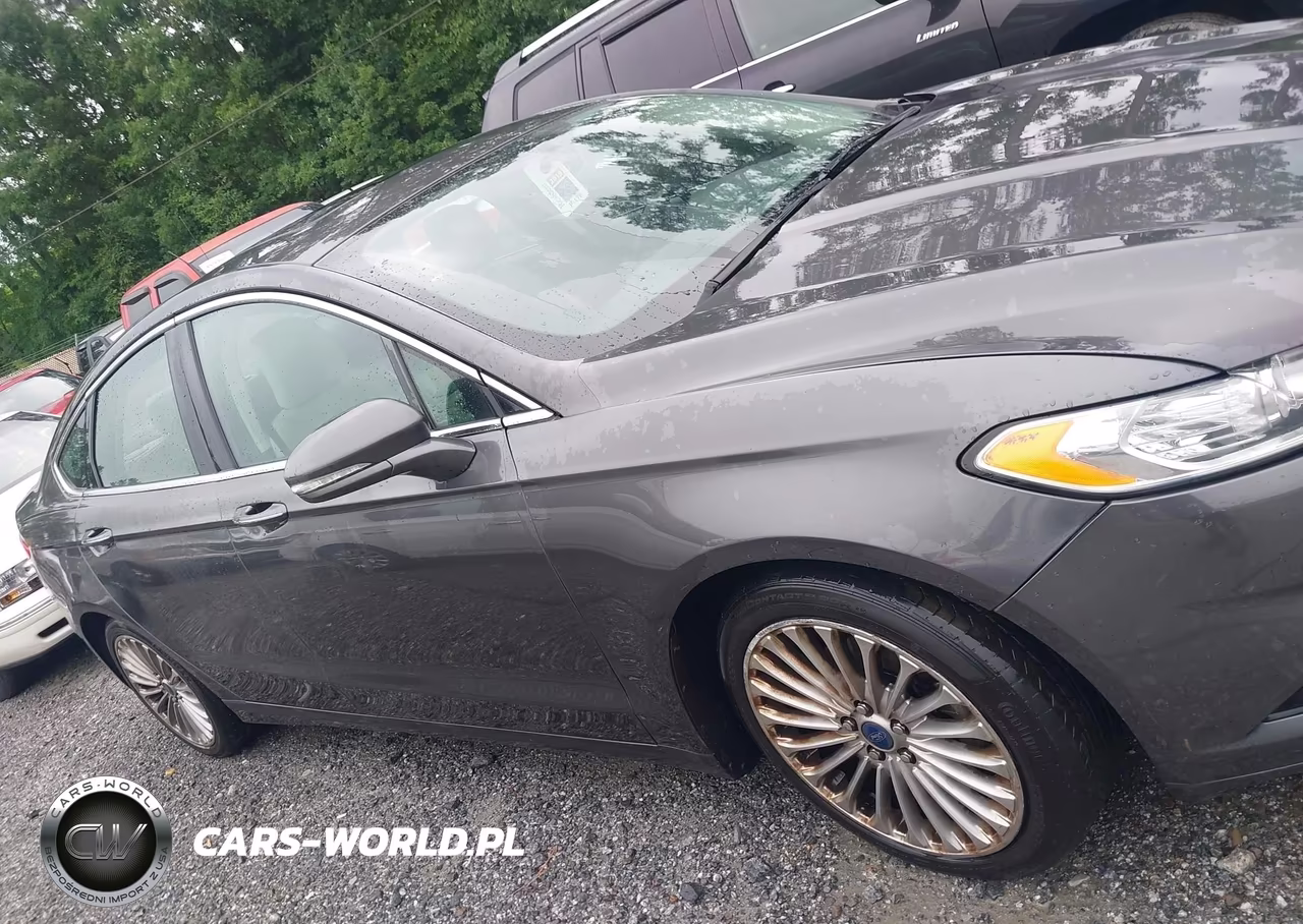 2016 Ford Fusion Titanium VIN:3FA6P0K91GR319330 - 13