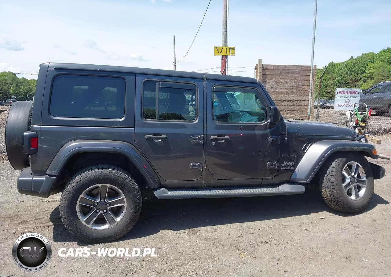 2018 Jeep Wrangler Unlimited Sahara 4X4 VIN:1C4HJXEG2JW240308 - 12