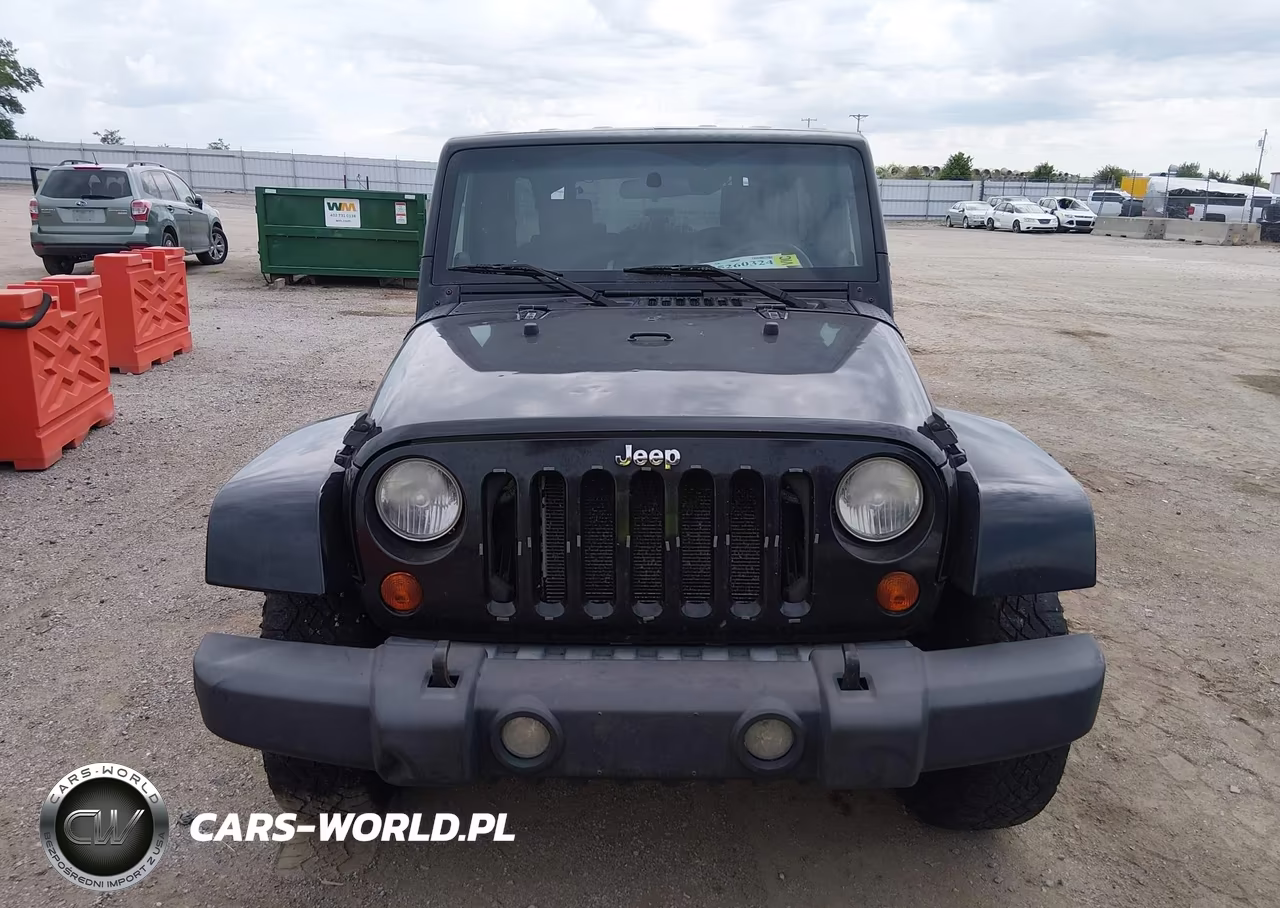 2007 Jeep Wrangler Unlimited Sahara VIN:1J4GA59117L120476 - 12
