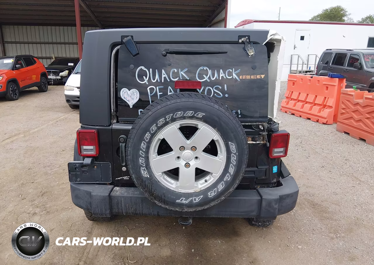 2007 Jeep Wrangler Unlimited Sahara VIN:1J4GA59117L120476 - 16