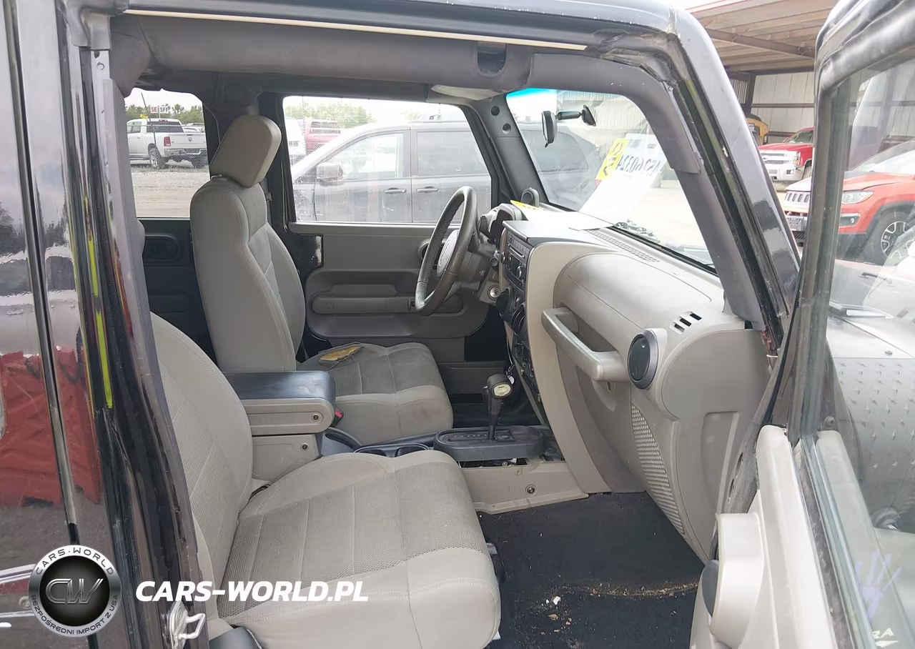 2007 Jeep Wrangler Unlimited Sahara VIN:1J4GA59117L120476 - 5