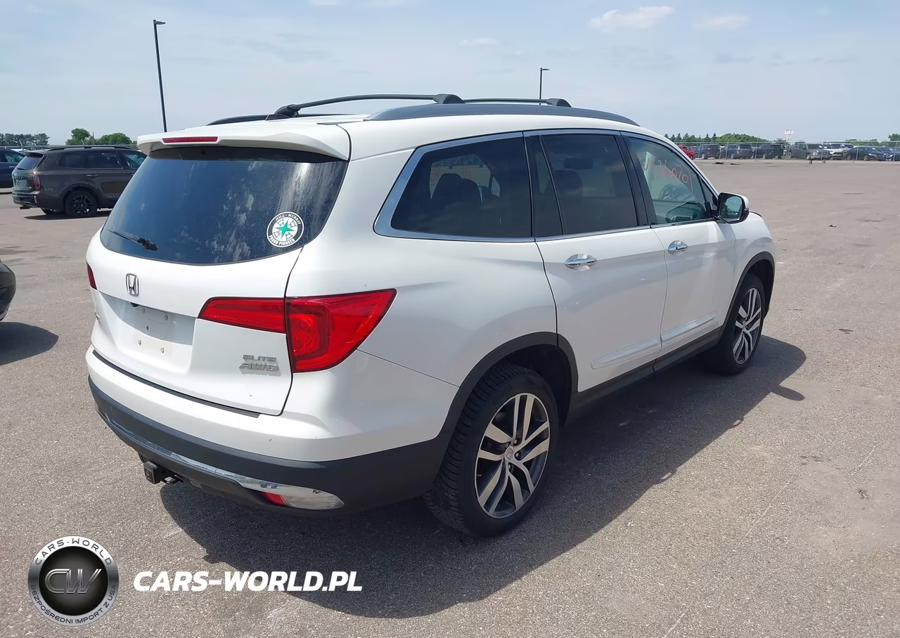 2017 Honda Pilot Elite VIN:5FNYF6H0XHB050345 - 4