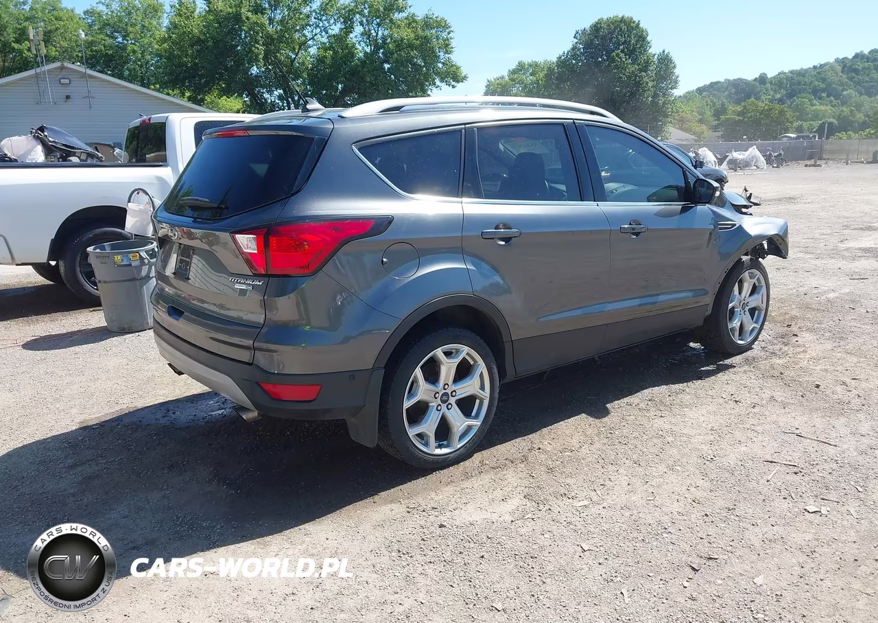 2019 Ford Escape Titanium VIN:1FMCU9J90KUB51690 - 4
