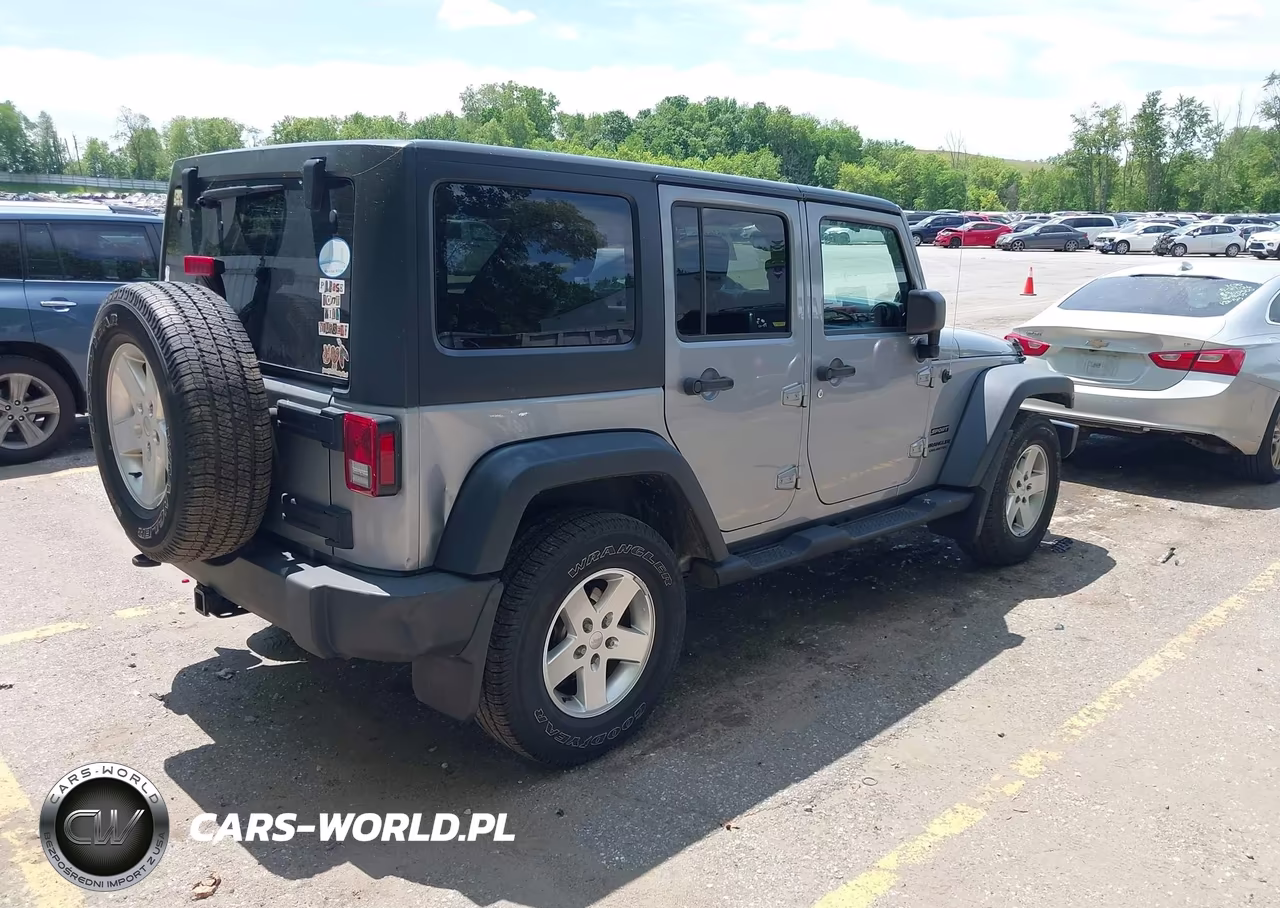 2014 Jeep Wrangler Unlimited Sport VIN:1C4BJWDG7EL103437 - 4