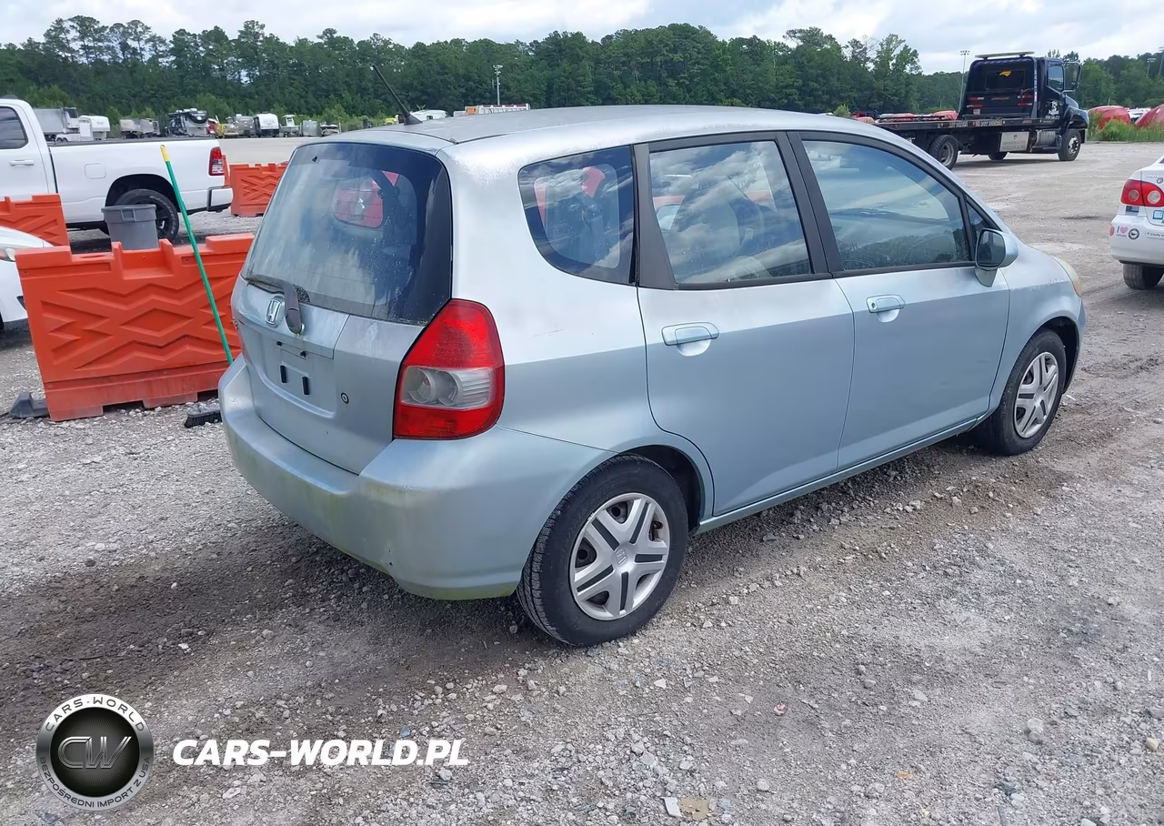 2007 Honda Fit VIN:JHMGD38497S020384 - 4