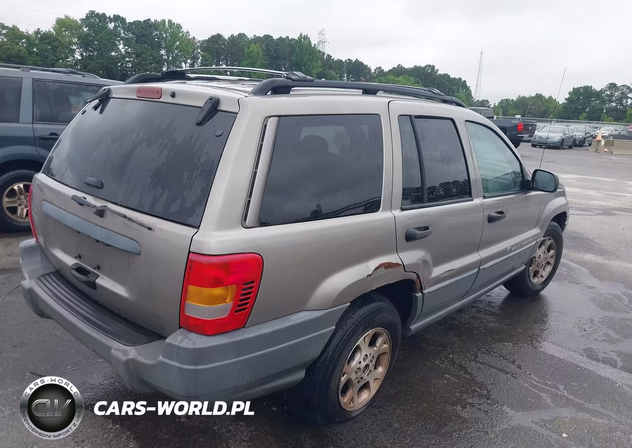 1999 Jeep Grand Cherokee Laredo VIN:1J4G258S8XC610758 - 4