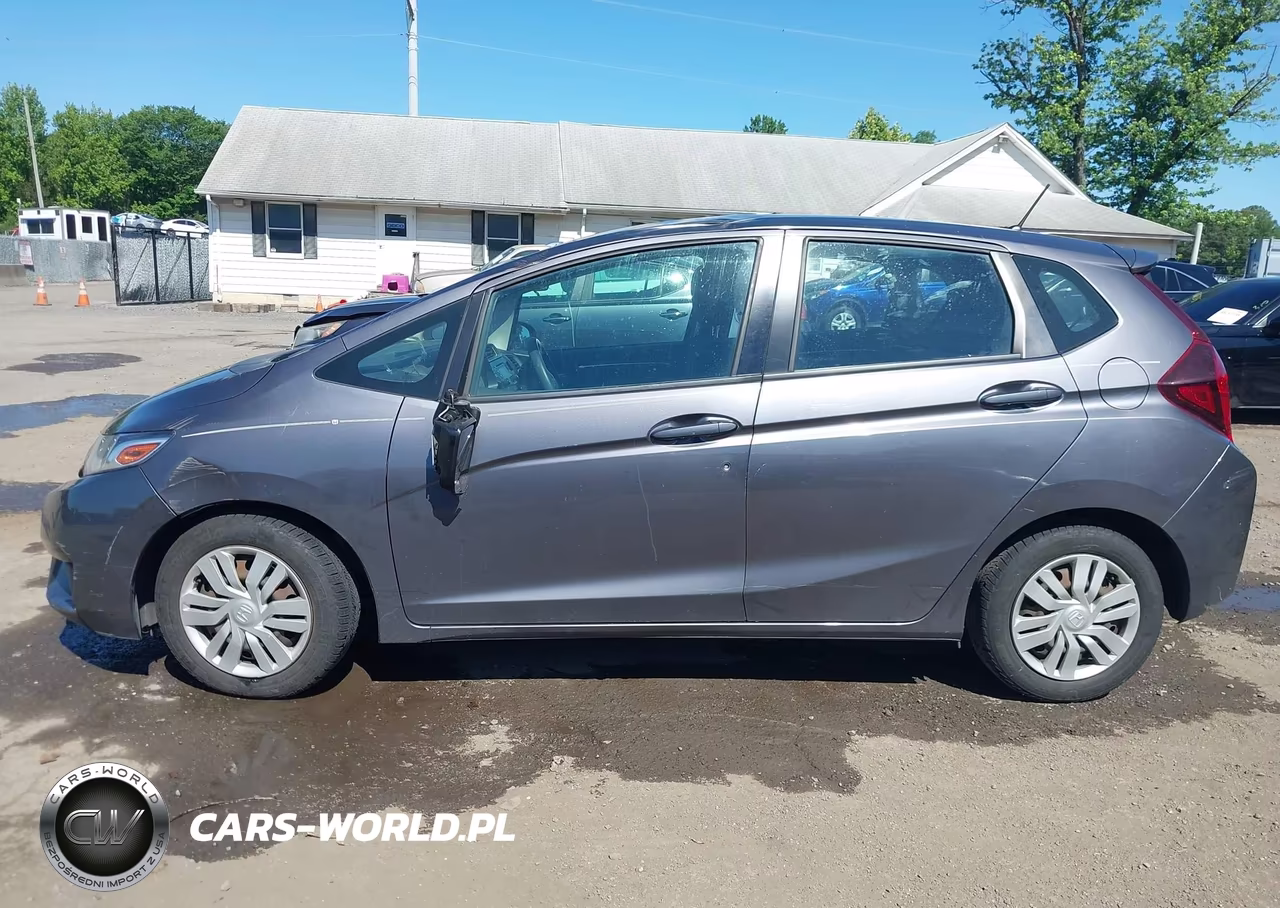 2015 Honda Fit Lx VIN:3HGGK5H51FM733297 - 14