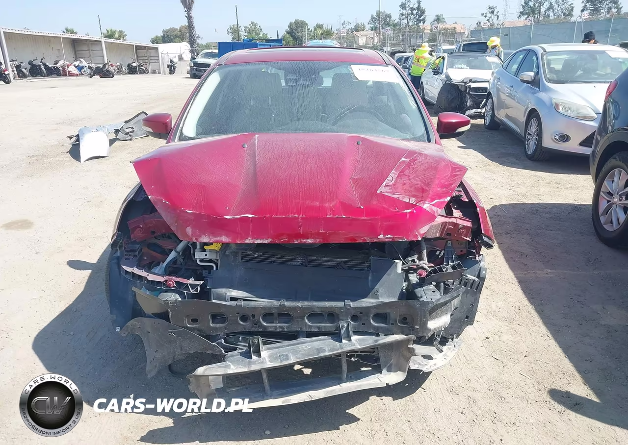 2015 Ford Focus Titanium VIN:1FADP3N23FL261757 - 6