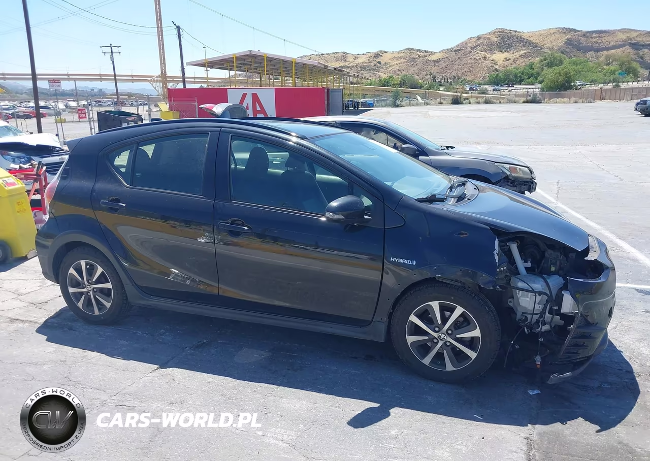 2018 Toyota Prius C Three VIN:JTDKDTB31J1601709 - 14
