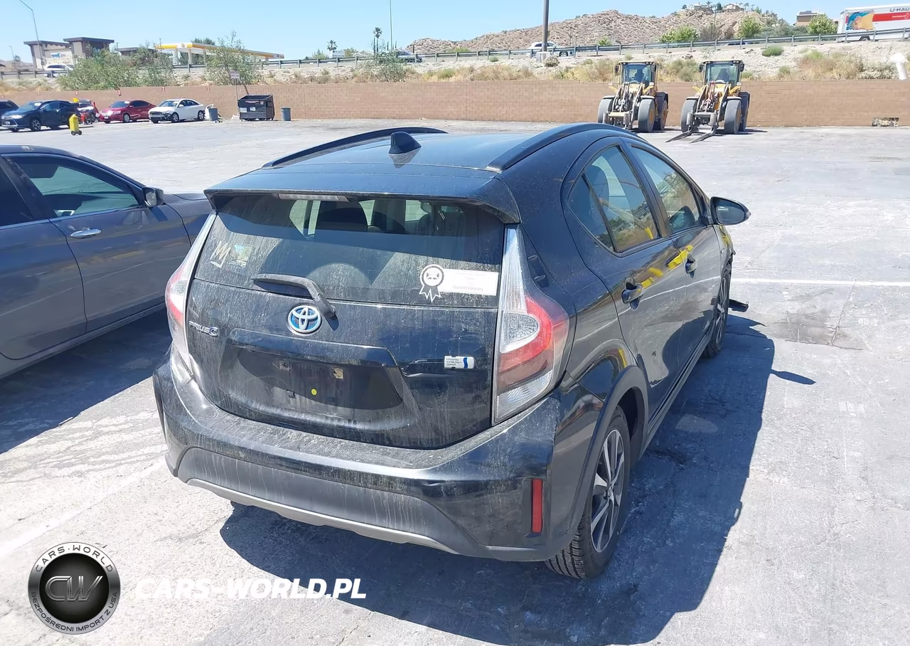 2018 Toyota Prius C Three VIN:JTDKDTB31J1601709 - 4