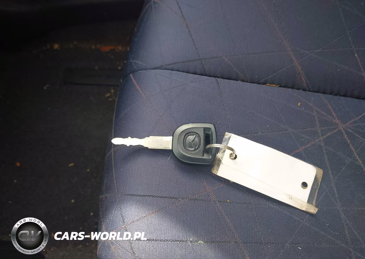 2011 Mazda Mazda2 Sport VIN:JM1DE1HYXB0129482 - 11