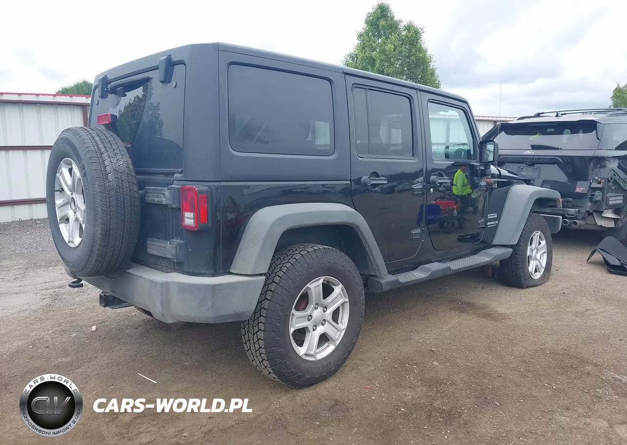 2015 Jeep Wrangler Unlimited Sport VIN:1C4BJWDG2FL747199 - 4