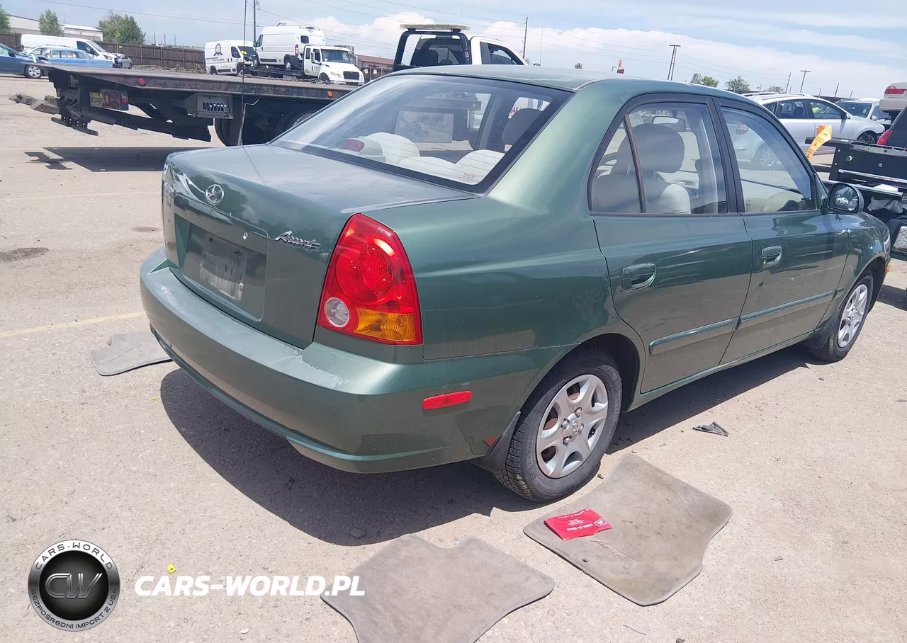 2005 Hyundai Accent Gls VIN:KMHCG45C25U672351 - 4