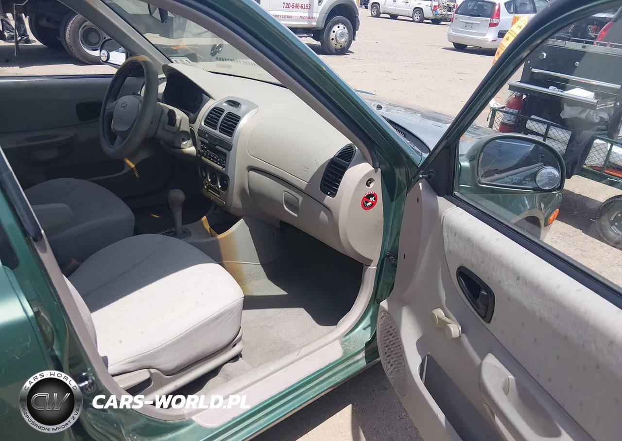 2005 Hyundai Accent Gls VIN:KMHCG45C25U672351 - 5
