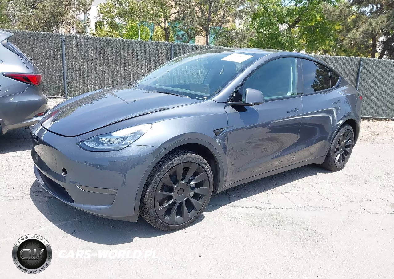 2023 Tesla Model Y Awd-Long Range Dual Motor All-Wheel Drive VIN:7SAYGDEE3PA057217 - 2