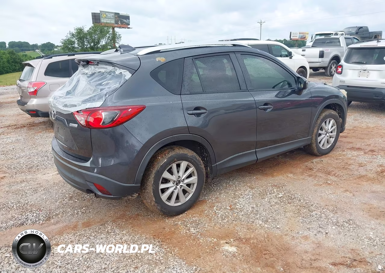 2015 Mazda Cx-5 Touring VIN:JM3KE2CY3F0529594 - 4