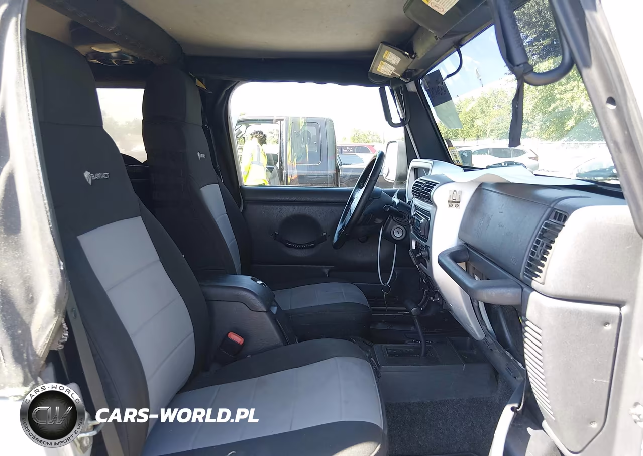 2005 Jeep Wrangler Unlimited VIN:1J4FA44S85P301506 - 5