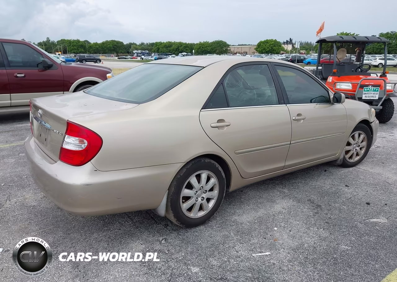2002 Toyota Camry Xle VIN:4T1BE30K12U043427 - 4