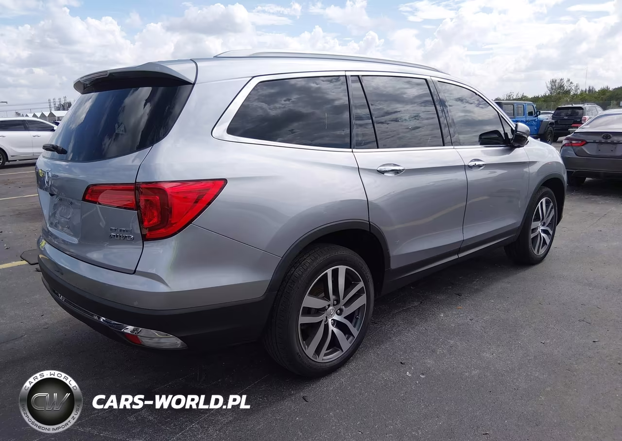 2017 Honda Pilot Elite VIN:5FNYF6H00HB047261 - 4