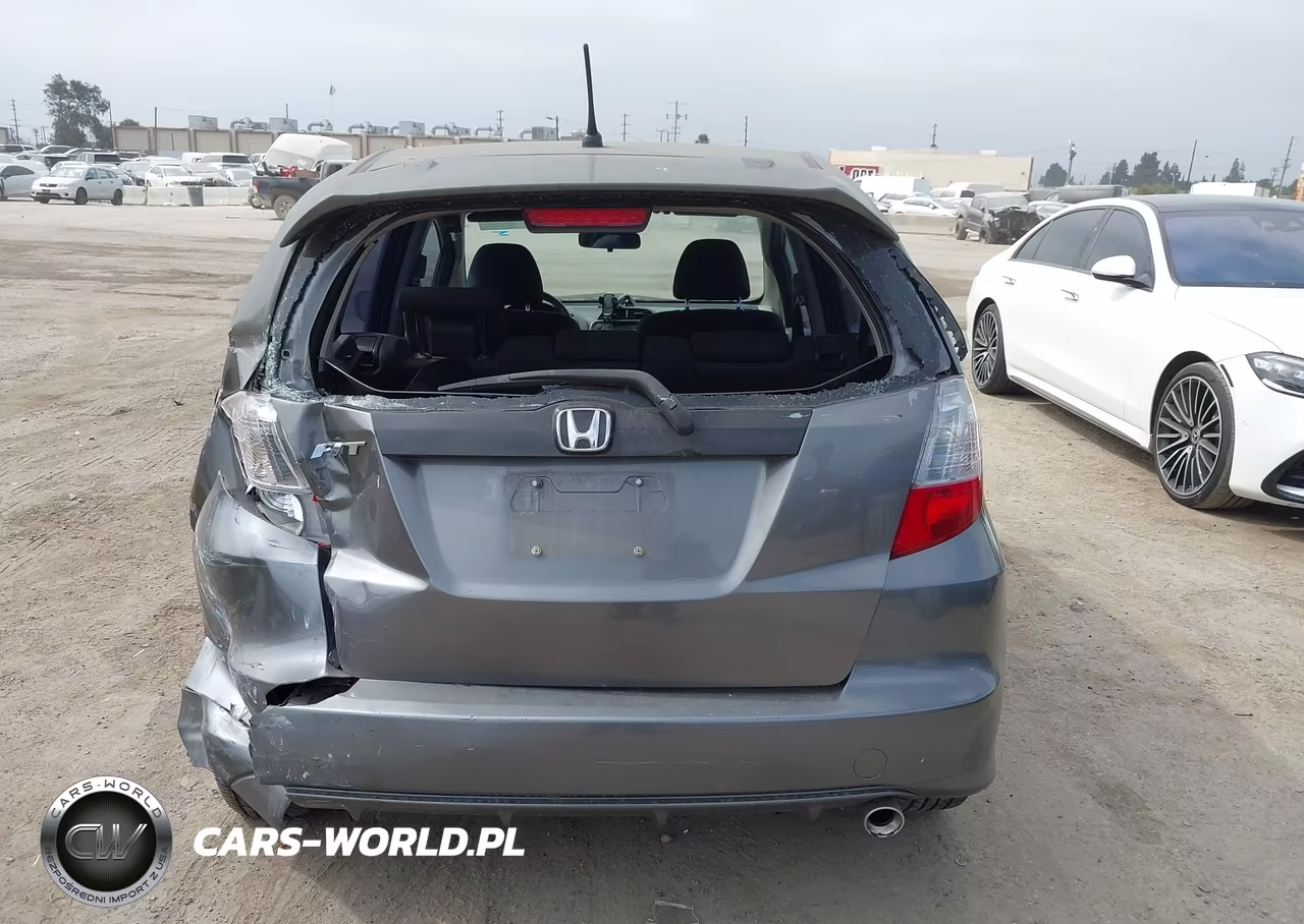 2013 Honda Fit Sport VIN:JHMGE8H50DC031654 - 16