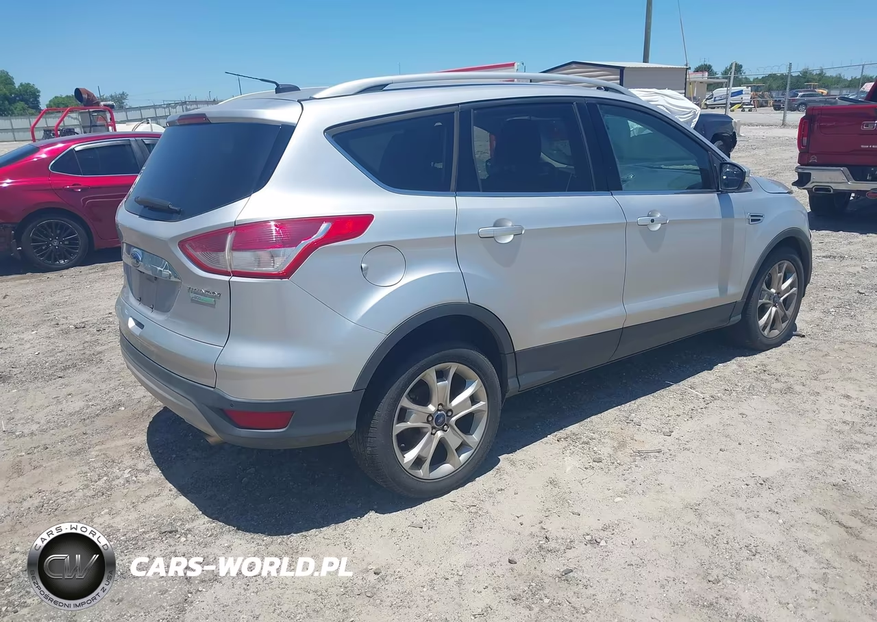 2015 Ford Escape Titanium VIN:1FMCU0JX9FUC55255 - 4