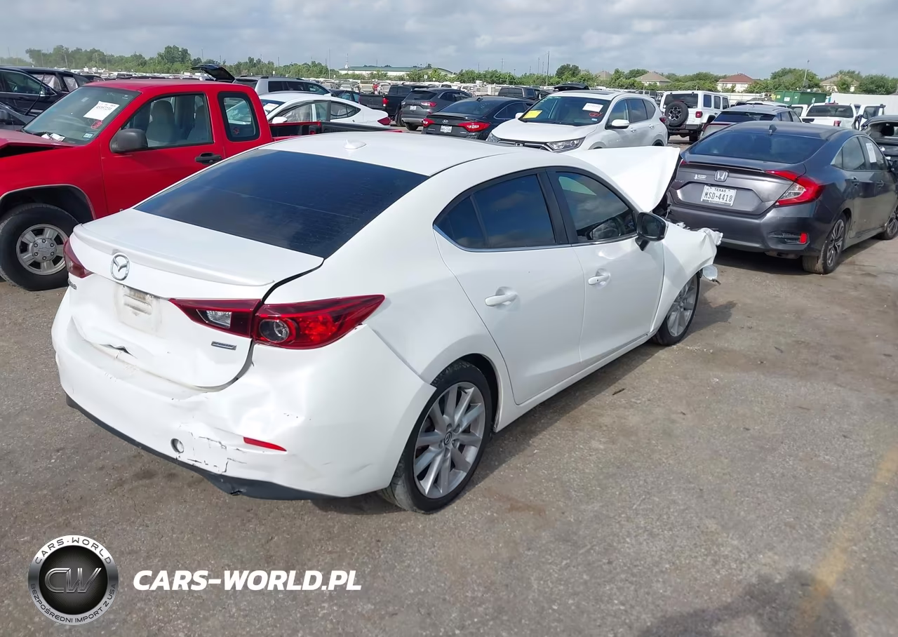 2017 Mazda Mazda3 Touring VIN:3MZBN1V74HM100128 - 4