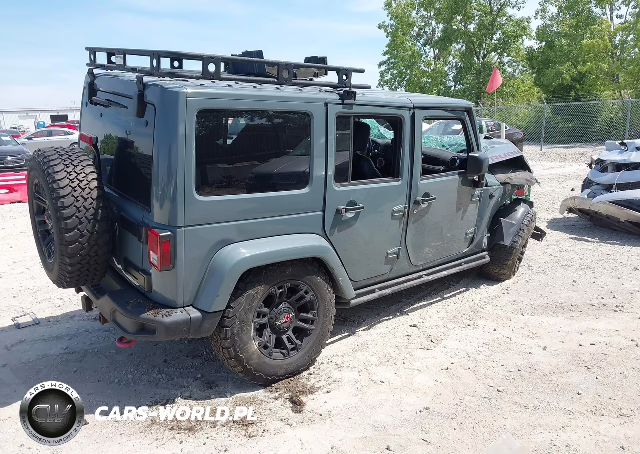 2015 Jeep Wrangler Unlimited Rubicon Hard Rock VIN:1C4BJWFGXFL548737 - 4