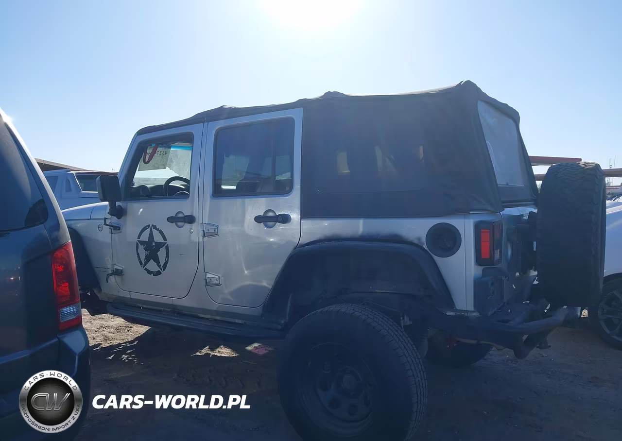 2012 Jeep Wrangler Unlimited Sport VIN:1C4BJWDG1CL217012 - 14