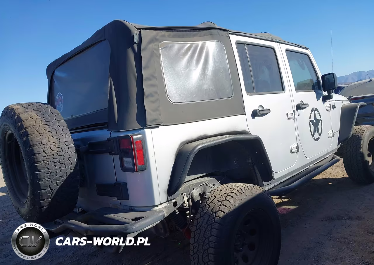 2012 Jeep Wrangler Unlimited Sport VIN:1C4BJWDG1CL217012 - 4