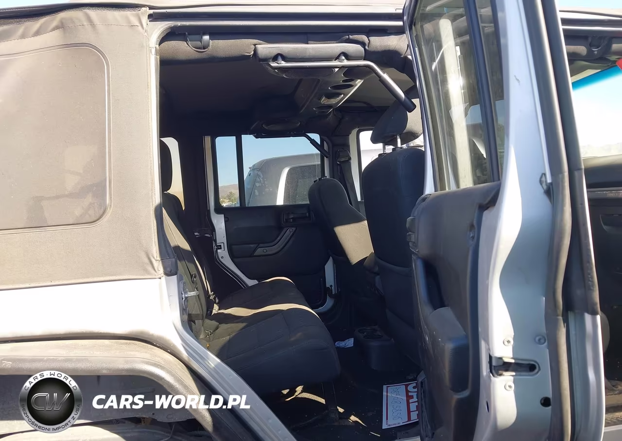 2012 Jeep Wrangler Unlimited Sport VIN:1C4BJWDG1CL217012 - 8