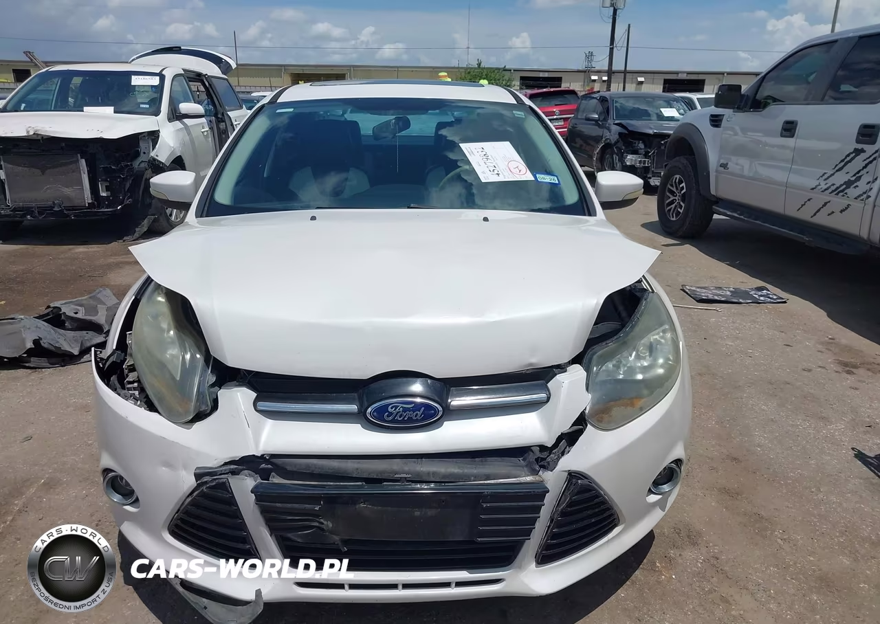 2014 Ford Focus Titanium VIN:1FADP3J24EL108695 - 12