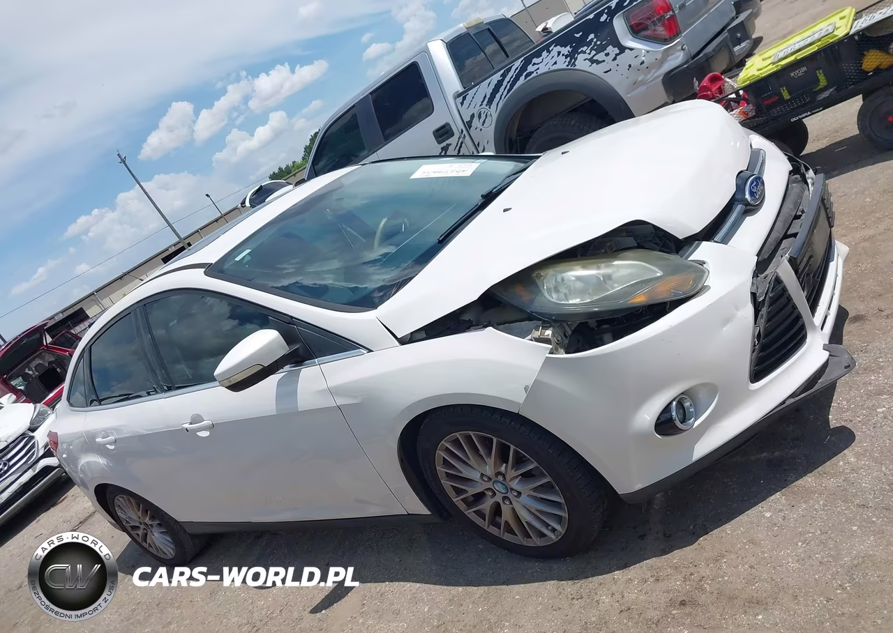 2014 Ford Focus Titanium VIN:1FADP3J24EL108695 - 13