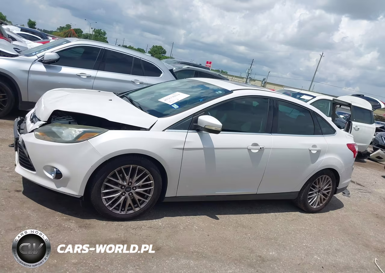 2014 Ford Focus Titanium VIN:1FADP3J24EL108695 - 14