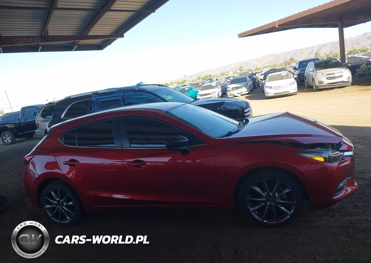 2018 Mazda Mazda3 Touring VIN:3MZBN1L32JM198601 - 13