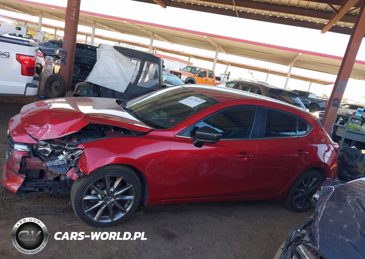 2018 Mazda Mazda3 Touring VIN:3MZBN1L32JM198601 - 14