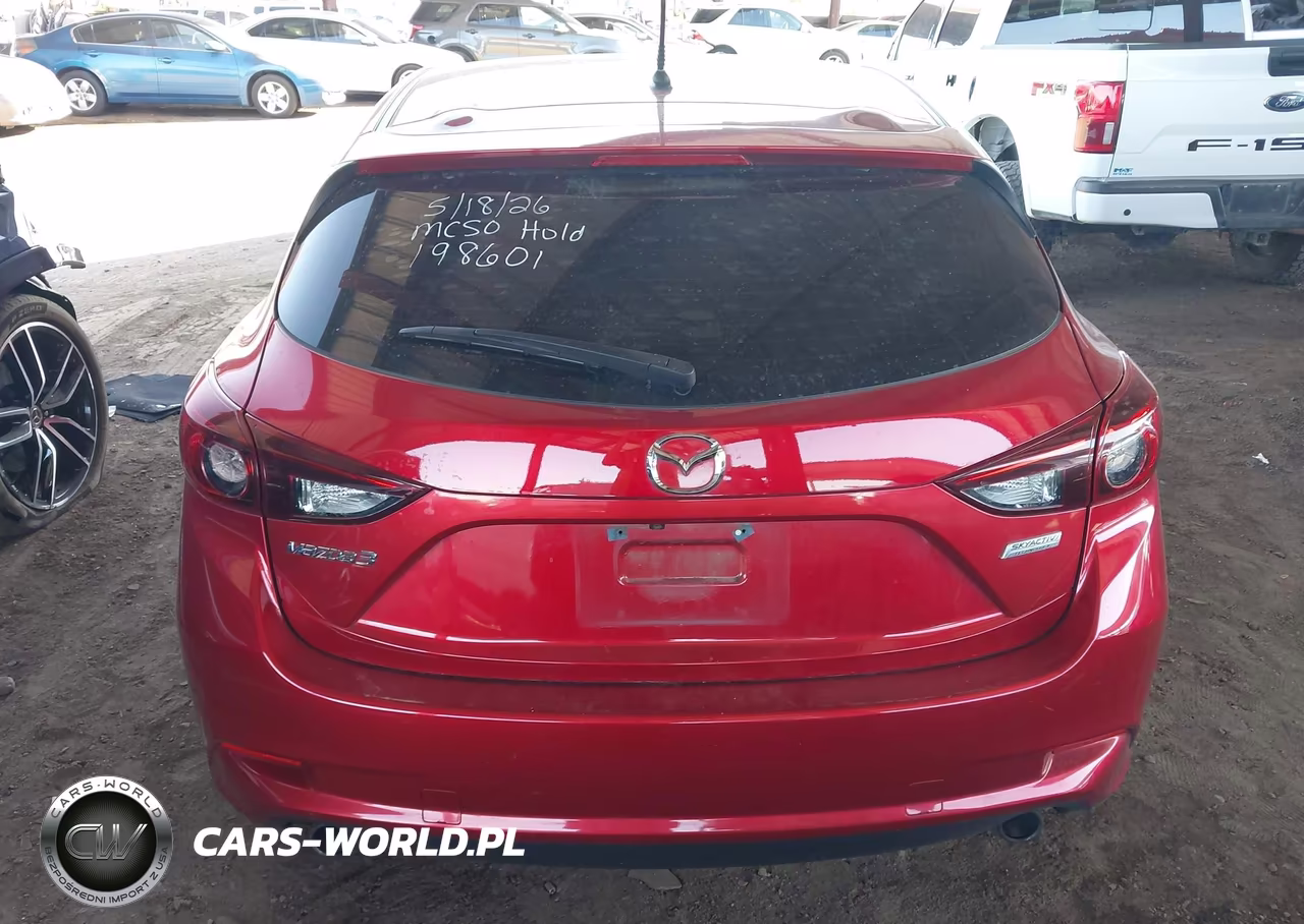 2018 Mazda Mazda3 Touring VIN:3MZBN1L32JM198601 - 16