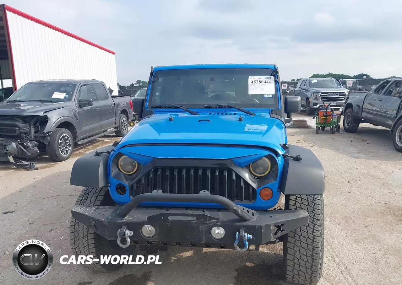 2011 Jeep Wrangler Unlimited Sport VIN:1J4BA3H11BL600915 - 12