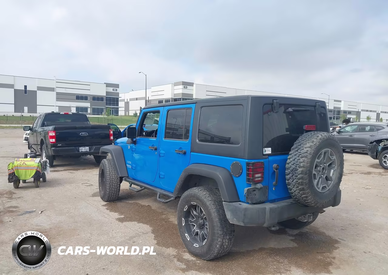2011 Jeep Wrangler Unlimited Sport VIN:1J4BA3H11BL600915 - 3