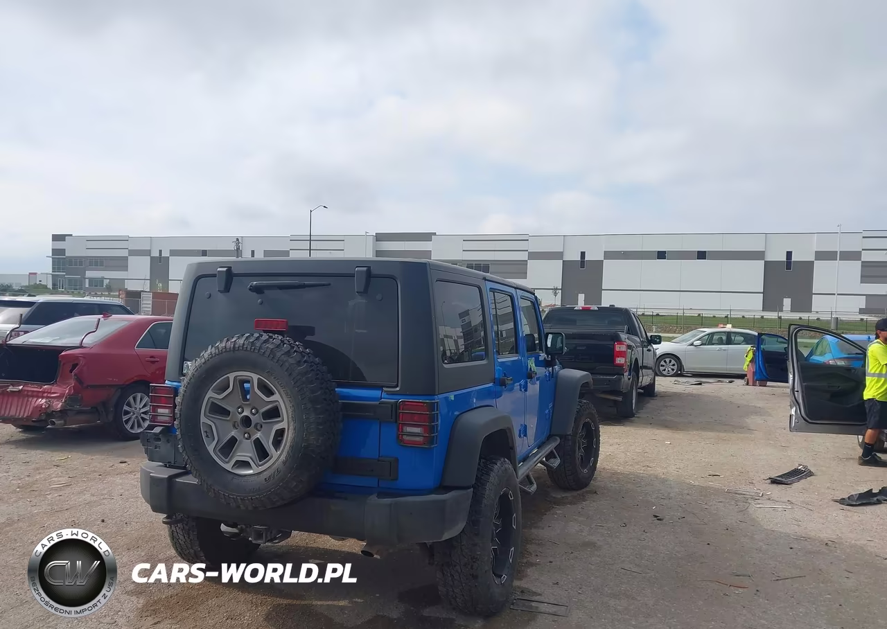 2011 Jeep Wrangler Unlimited Sport VIN:1J4BA3H11BL600915 - 4
