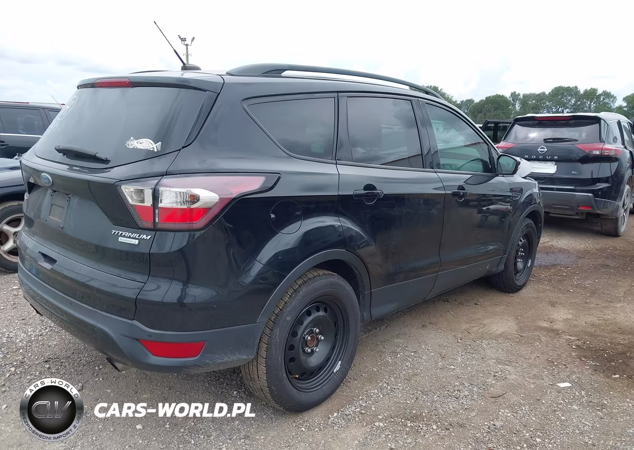 2017 Ford Escape Titanium VIN:1FMCU0JD0HUC95135 - 4
