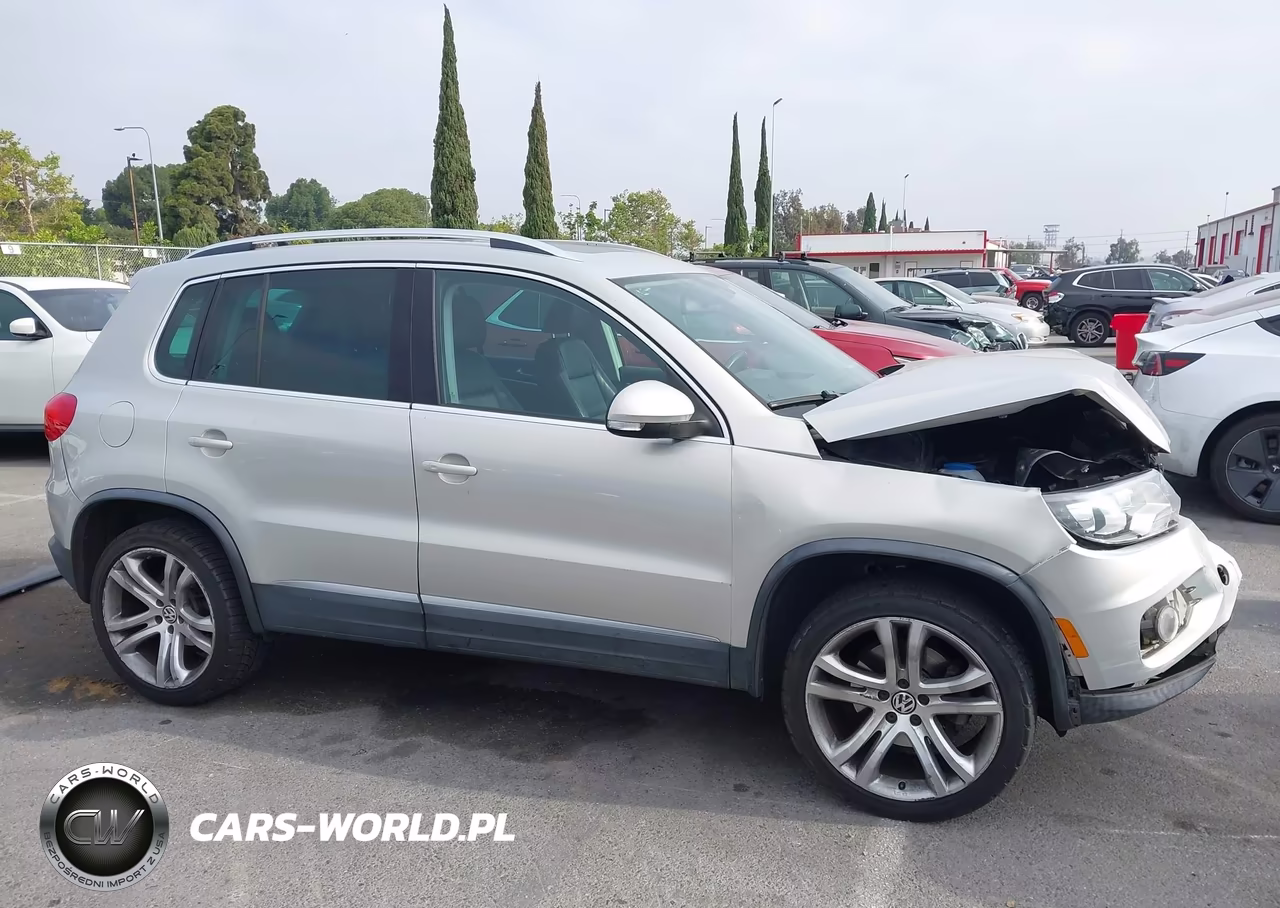 2012 Volkswagen Tiguan Sel VIN:WVGAV7AX8CW610266 - 13