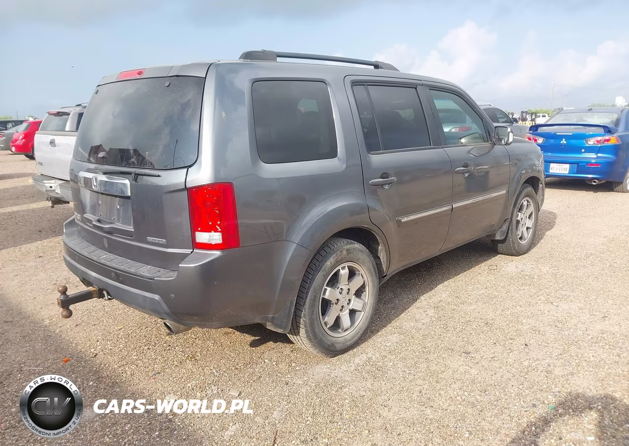 2011 Honda Pilot Touring VIN:5FNYF3H94BB055075 - 4